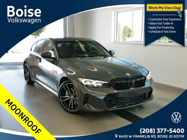 2023 BMW 3 Series 330i xDrive in Individual Dravit Gray Metallic — front three-quarter view